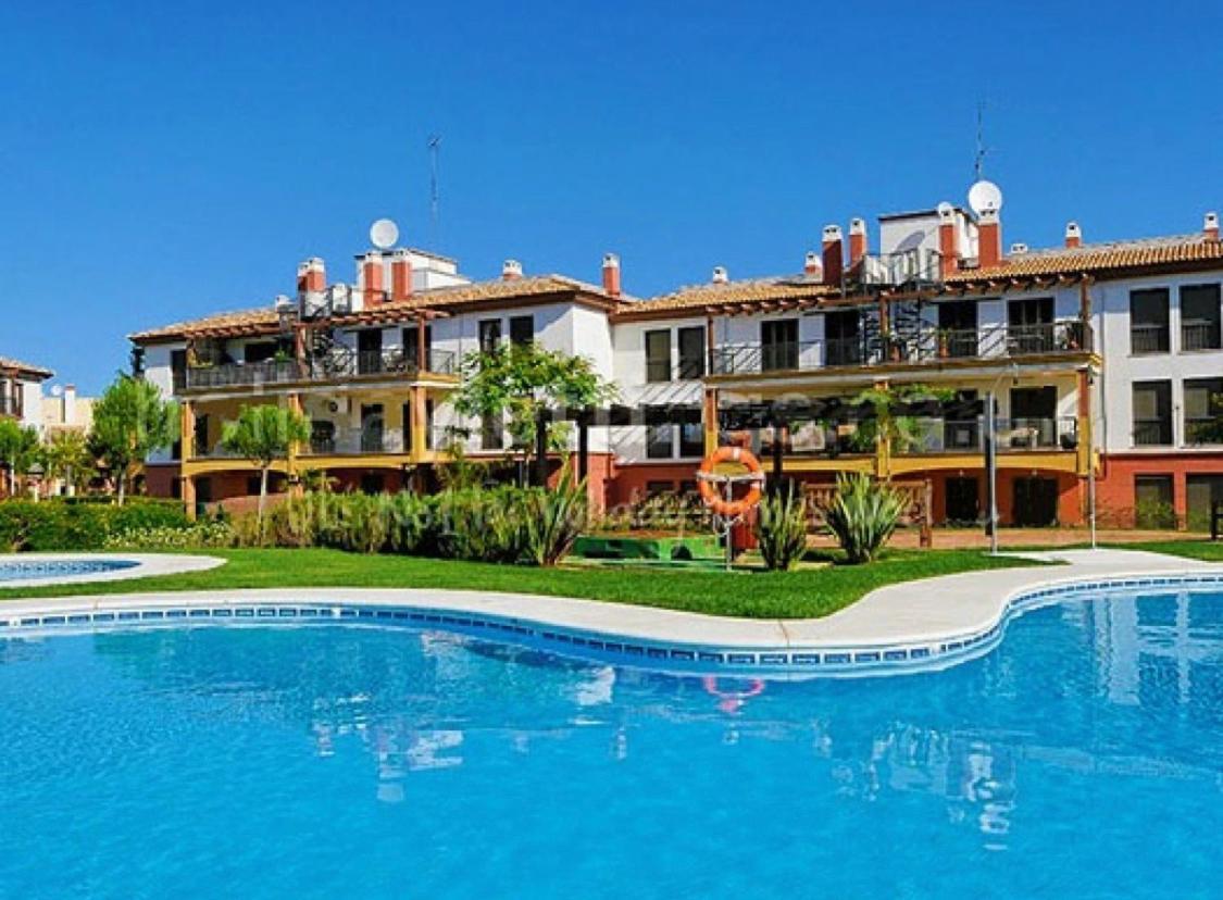 Apartamento con jardín privado y acceso a piscina Huelva Exterior foto