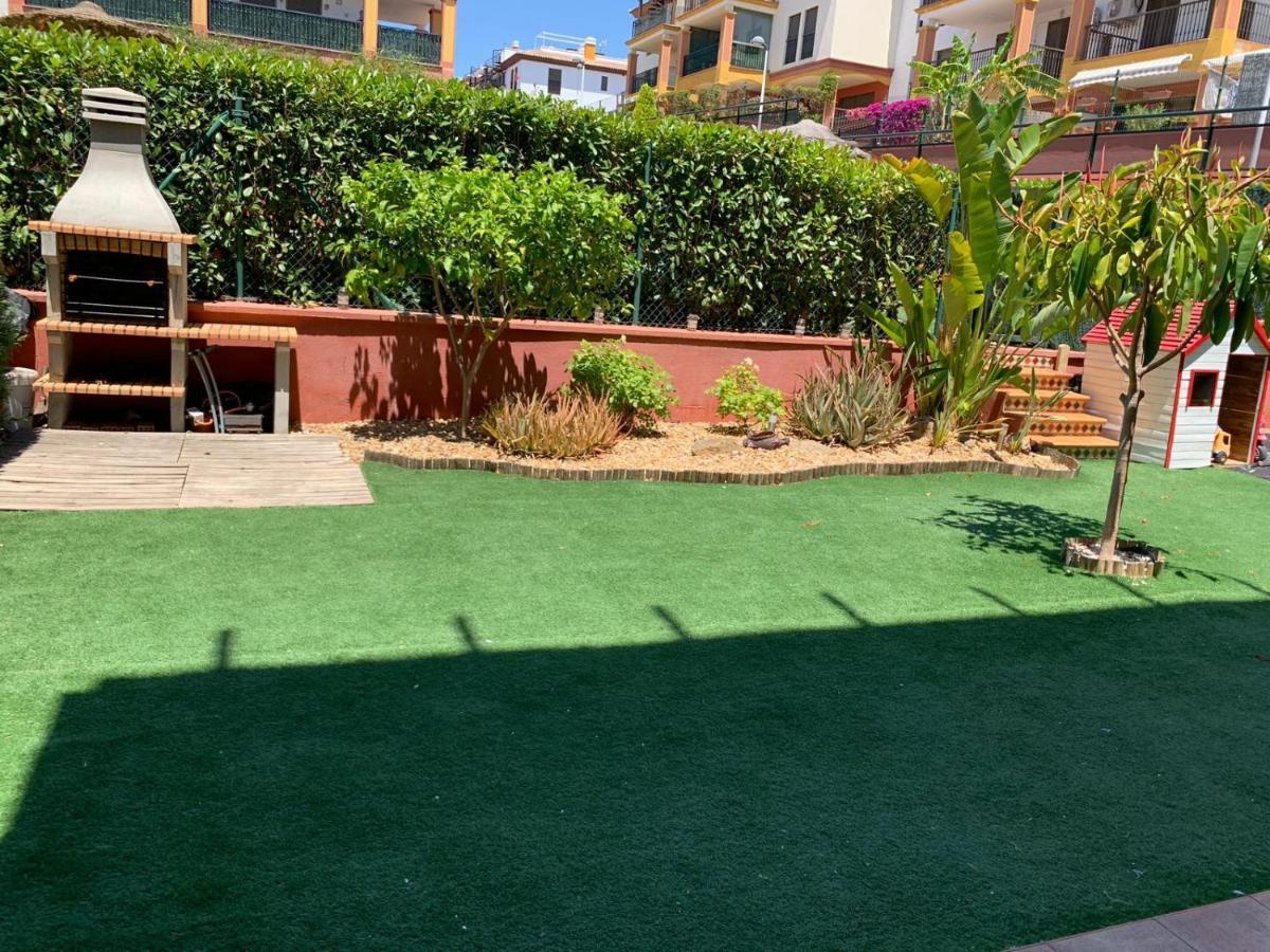 Apartamento con jardín privado y acceso a piscina Huelva Exterior foto